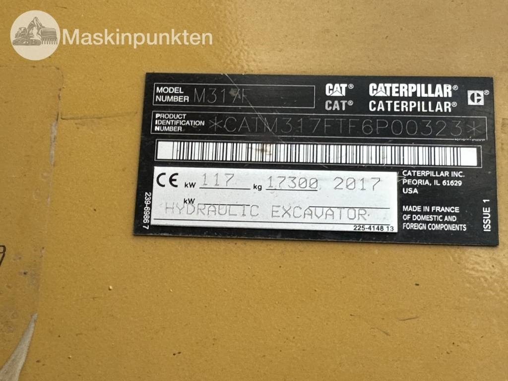 Gumikerekes kotró CAT M 317: 10 kép.