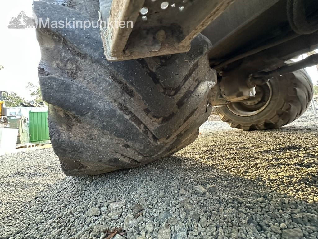 Gumikerekes kotró CAT M 317: 37 kép.