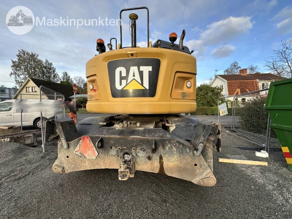 Gumikerekes kotró CAT M 317: 6 kép.