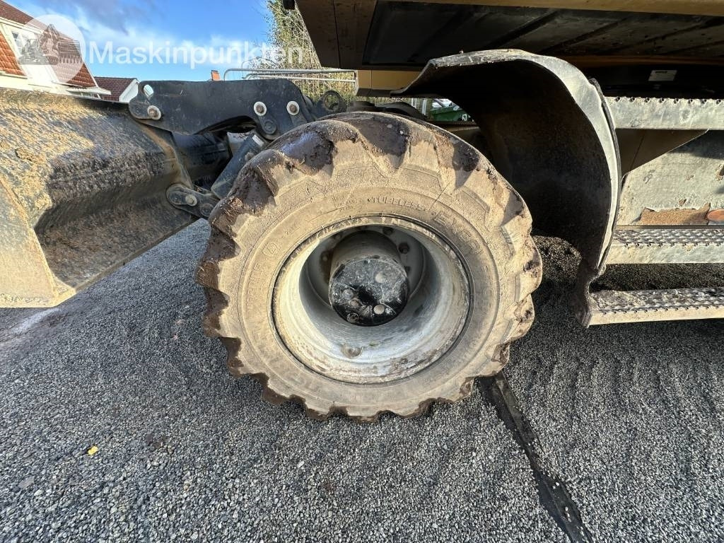 Gumikerekes kotró CAT M 317: 29 kép.