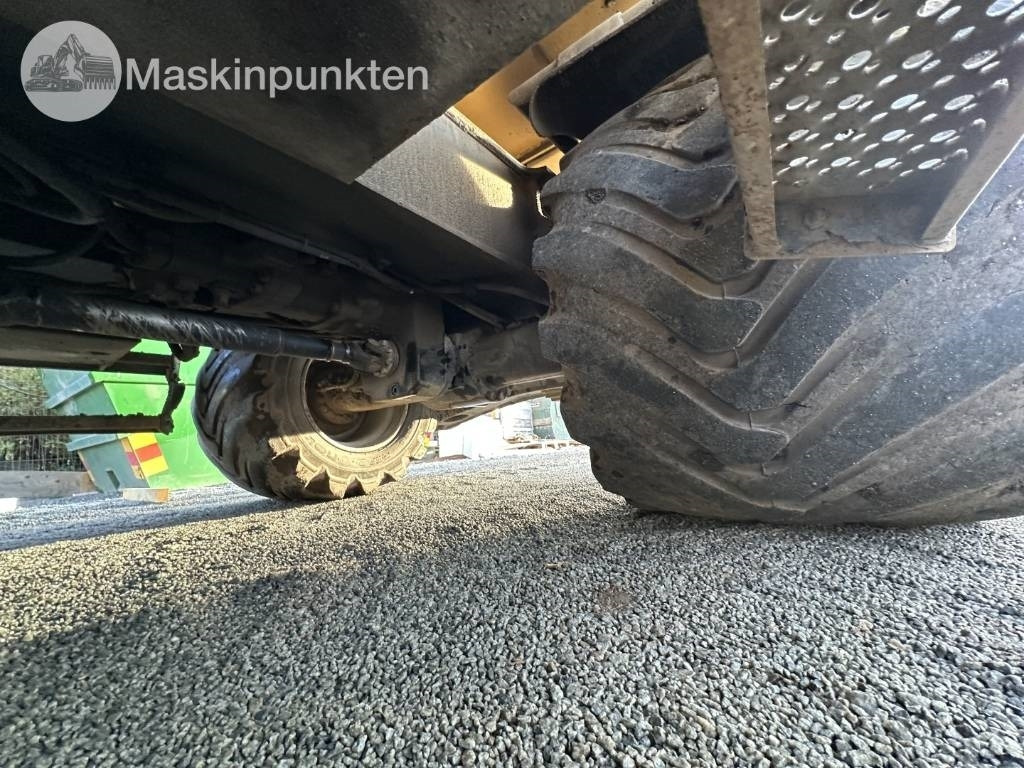Gumikerekes kotró CAT M 317: 33 kép.