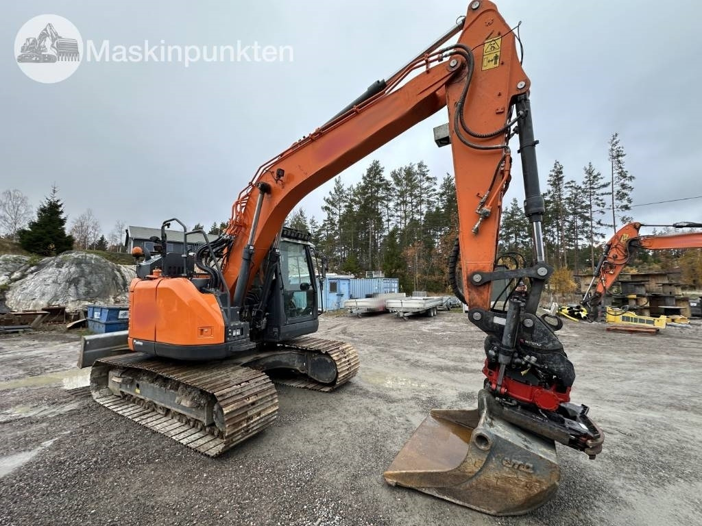Doosan DX 140 LCR-5 - Lánctalpas kotró: 4 kép. Doosan DX 140 LCR-5 - Lánctalpas kotró: 4 kép.