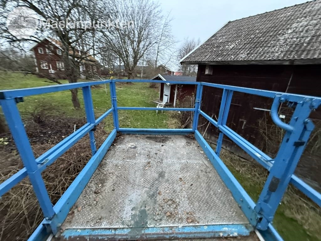 Genie GS 4390 - Ollós emelő: 3 kép. Genie GS 4390 - Ollós emelő: 3 kép.