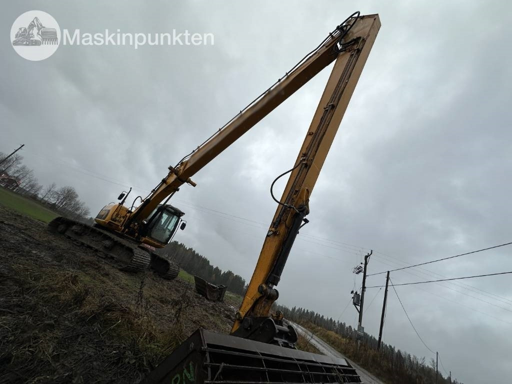 JCB JS 220 LC - Lánctalpas kotró: 3 kép. JCB JS 220 LC - Lánctalpas kotró: 3 kép.