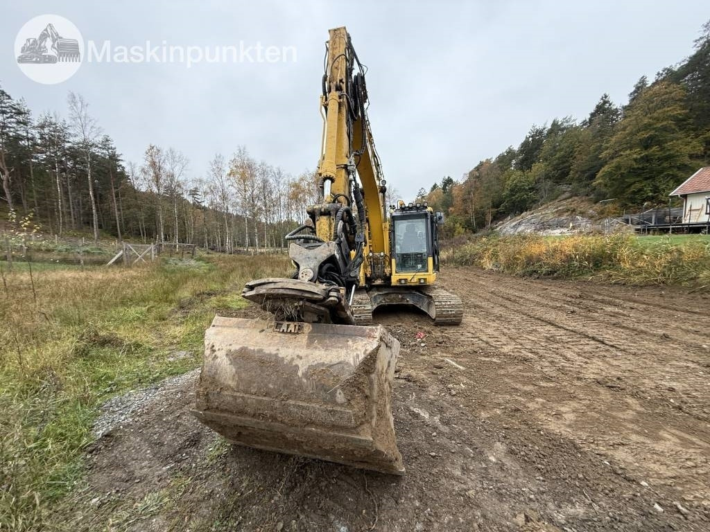 Komatsu PC 138 US-11 - Lánctalpas kotró: 2 kép. Komatsu PC 138 US-11 - Lánctalpas kotró: 2 kép.