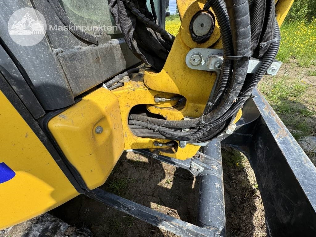 Minikotró Komatsu PC 26 MR: 37 kép.