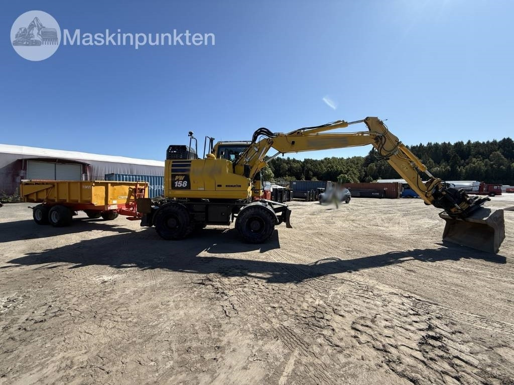 Komatsu PW 158 - Gumikerekes kotró: 5 kép. Komatsu PW 158 - Gumikerekes kotró: 5 kép.