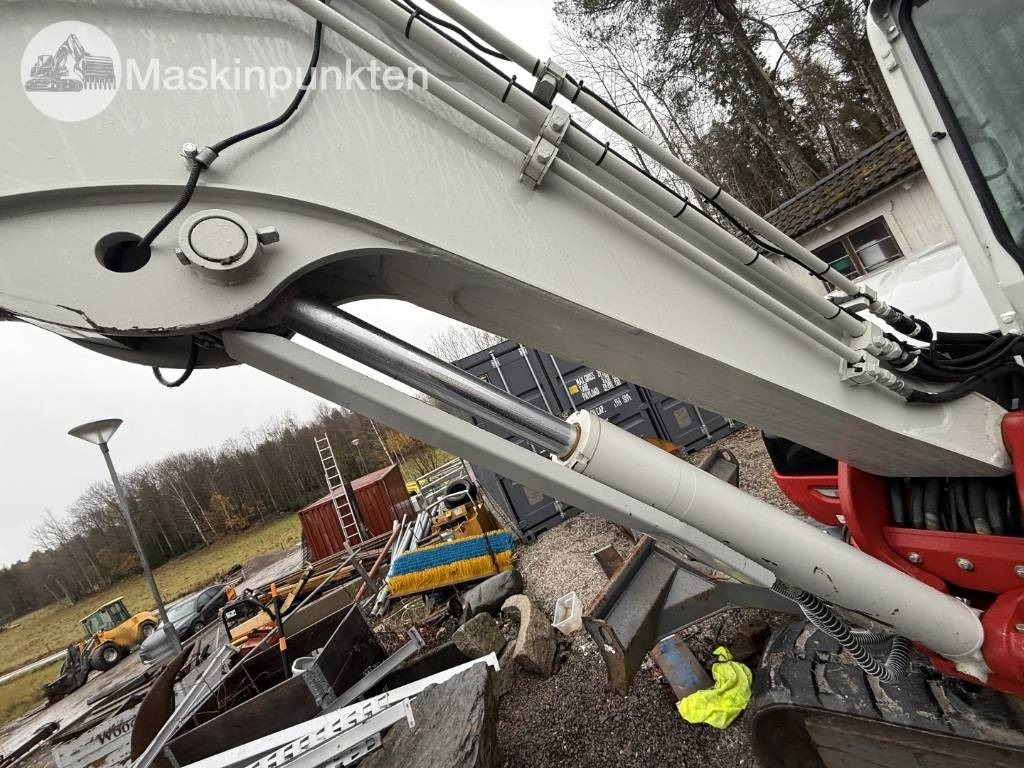 Lánctalpas kotró Takeuchi TB 370: 37 kép. Lánctalpas kotró Takeuchi TB 370: 37 kép.