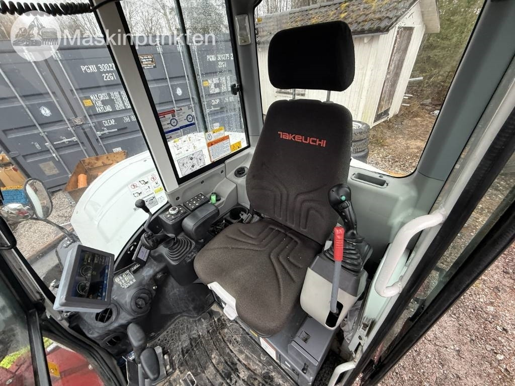 Lánctalpas kotró Takeuchi TB 370: 13 kép. Lánctalpas kotró Takeuchi TB 370: 13 kép.