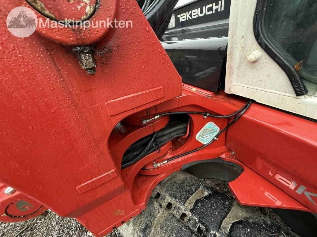 Lánctalpas kotró Takeuchi TB 370: 41 kép. Lánctalpas kotró Takeuchi TB 370: 41 kép.