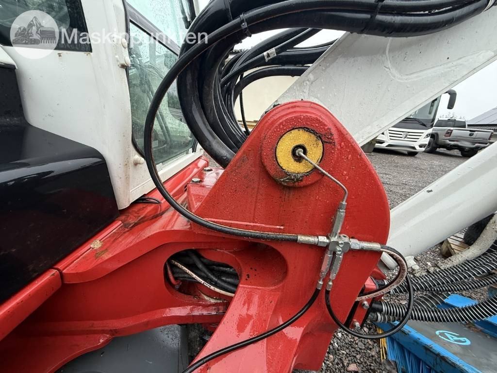 Lánctalpas kotró Takeuchi TB 370: 23 kép. Lánctalpas kotró Takeuchi TB 370: 23 kép.