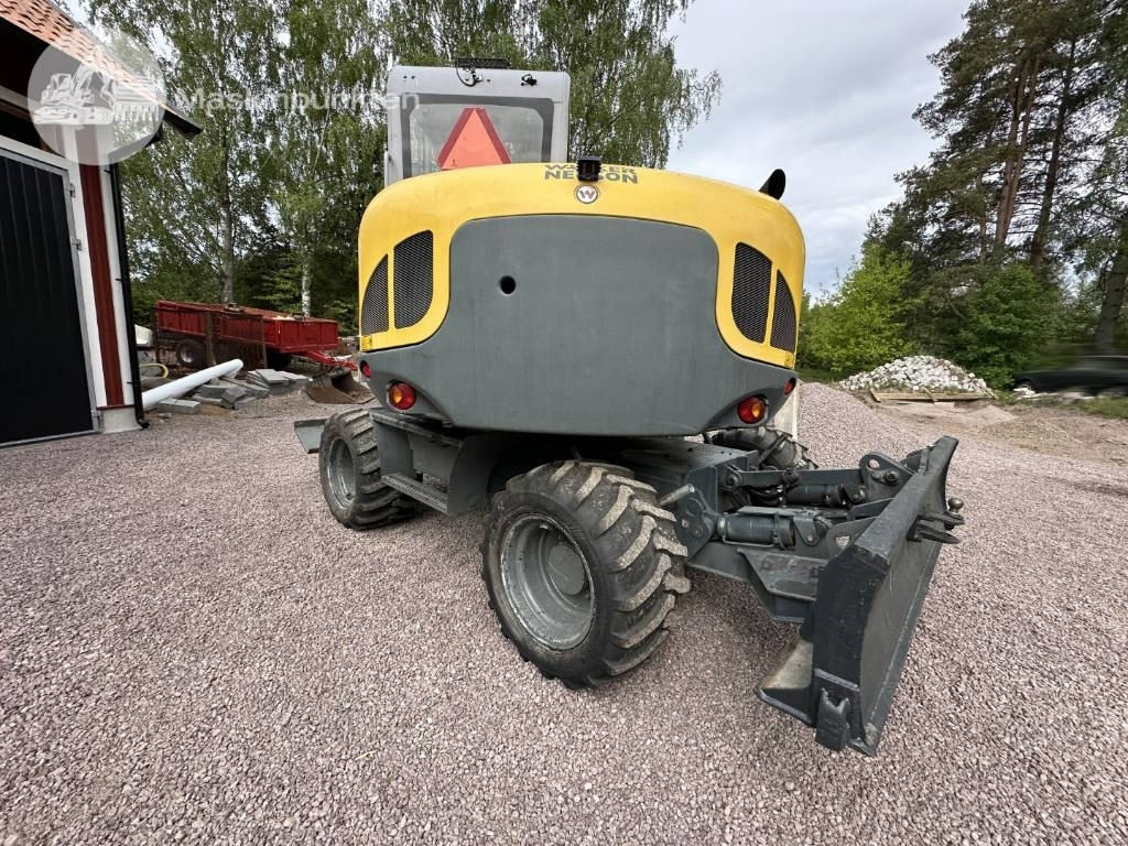 Wacker Neuson 9503 - Gumikerekes kotró: 5 kép. Wacker Neuson 9503 - Gumikerekes kotró: 5 kép.