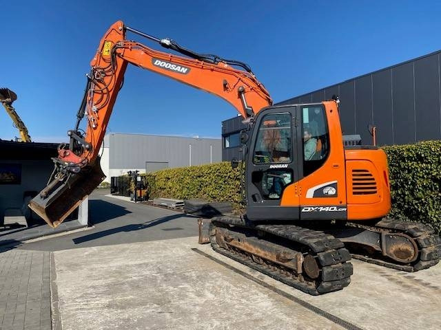 Doosan DX140 LCR-5 - Lánctalpas kotró: 1 kép. Doosan DX140 LCR-5 - Lánctalpas kotró: 1 kép.
