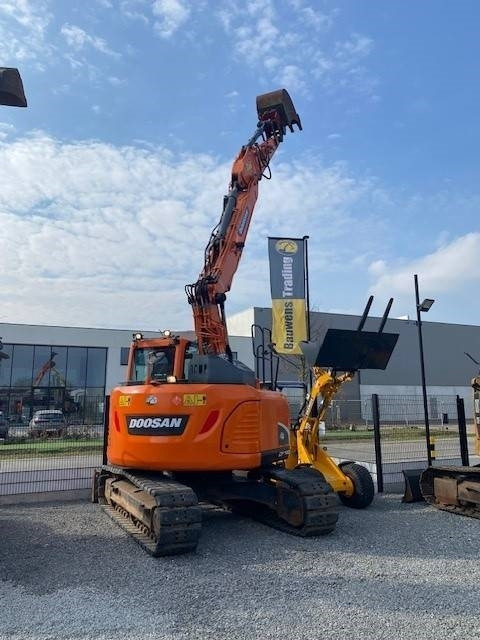 Doosan DX140 LCR-5 - Lánctalpas kotró: 2 kép. Doosan DX140 LCR-5 - Lánctalpas kotró: 2 kép.