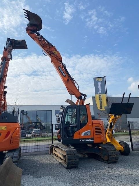 Doosan DX140LCR-5 - Lánctalpas kotró: 2 kép. Doosan DX140LCR-5 - Lánctalpas kotró: 2 kép.