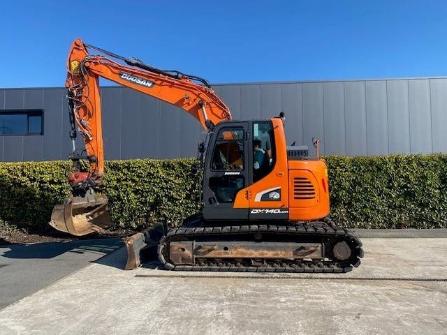 Doosan DX140LCR-5 - Lánctalpas kotró: 2 kép. Doosan DX140LCR-5 - Lánctalpas kotró: 2 kép.