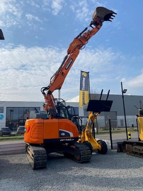 Doosan DX140LCR-5 - Lánctalpas kotró: 1 kép. Doosan DX140LCR-5 - Lánctalpas kotró: 1 kép.