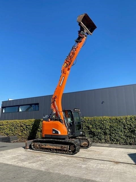 Doosan DX140LCR-5 - Lánctalpas kotró: 3 kép. Doosan DX140LCR-5 - Lánctalpas kotró: 3 kép.