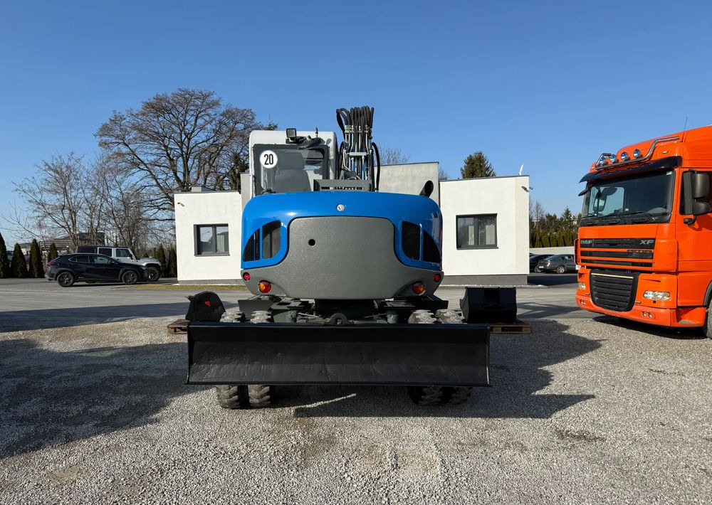 Wacker Neuson 9503-2 TRZY ŁYŻKI - Gumikerekes kotró: 5 kép. Wacker Neuson 9503-2 TRZY ŁYŻKI - Gumikerekes kotró: 5 kép.