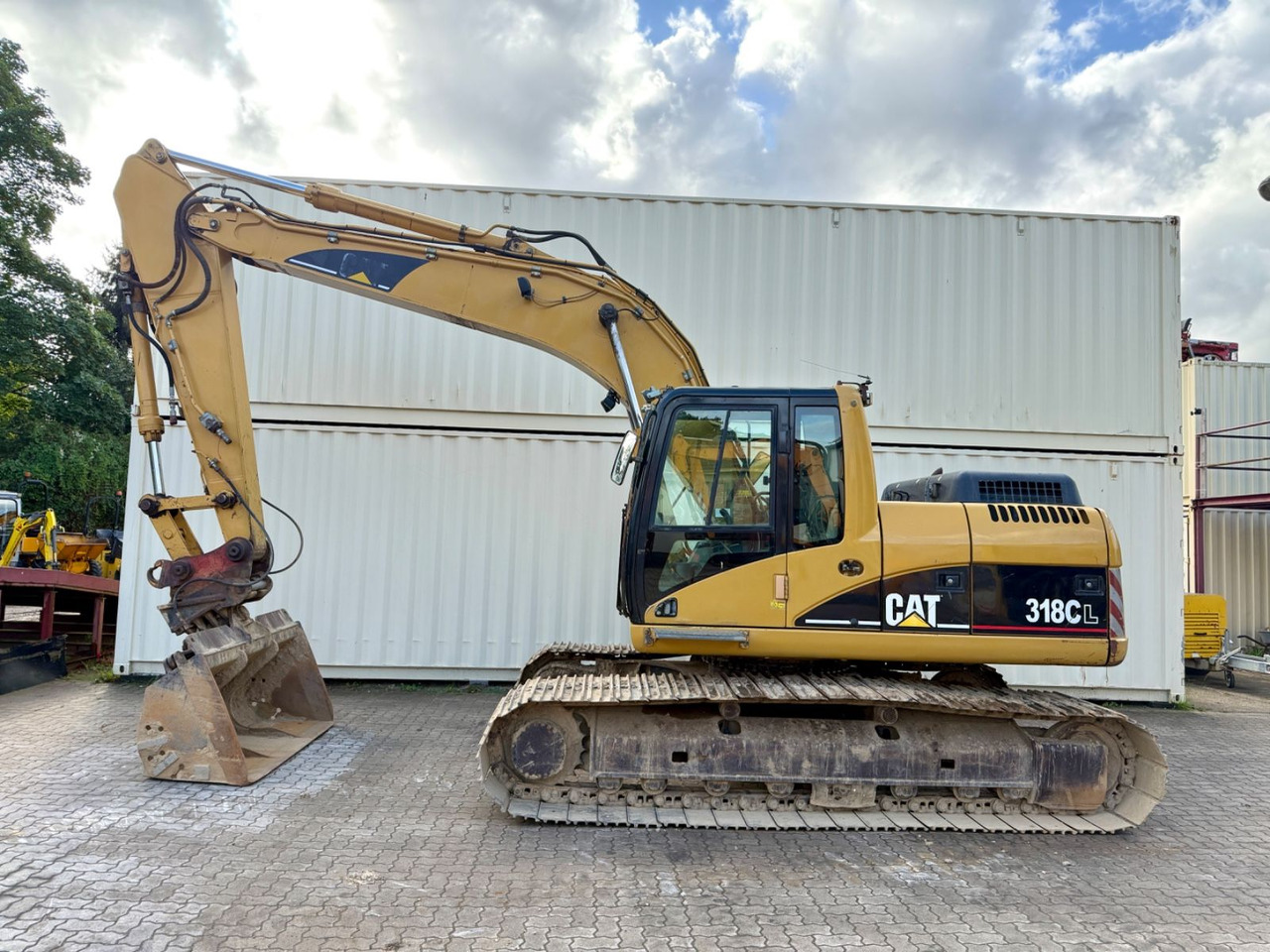 CAT 318CL / 2005 BJ / Deutsche Maschine - Lánctalpas kotró: 2 kép. CAT 318CL / 2005 BJ / Deutsche Maschine - Lánctalpas kotró: 2 kép.
