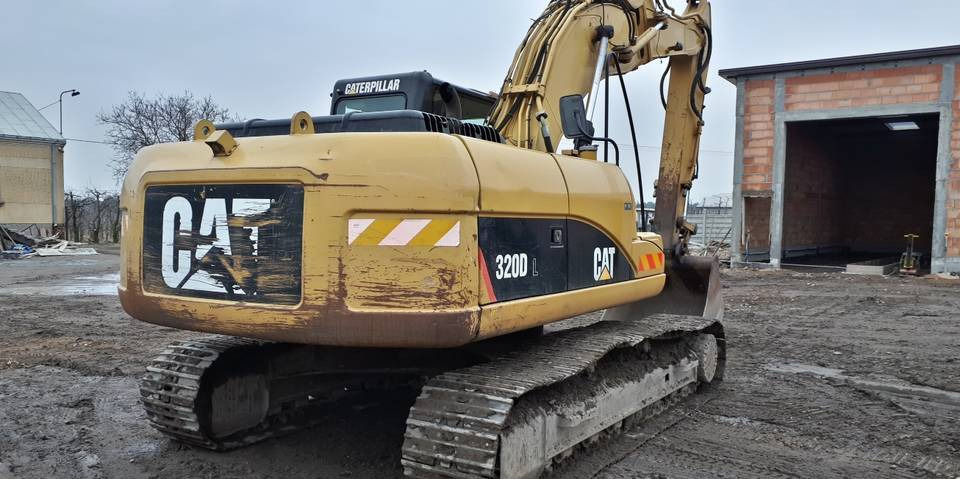 Koparka Caterpillar 320DL hydraulika klima kamera CAT - Lánctalpas kotró: 3 kép. Koparka Caterpillar 320DL hydraulika klima kamera CAT - Lánctalpas kotró: 3 kép.