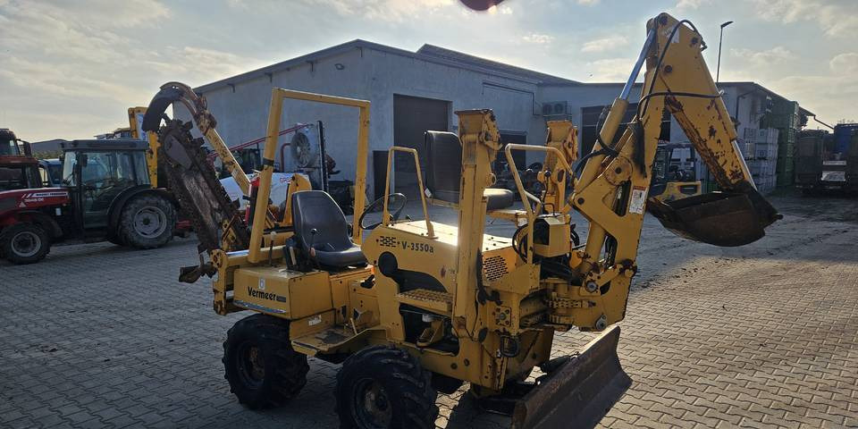 Koparka łańcuchowa Vermeer V3550 przesuw ramie kopiące pług - Árokásó: 4 kép. Koparka łańcuchowa Vermeer V3550 przesuw ramie kopiące pług - Árokásó: 4 kép.