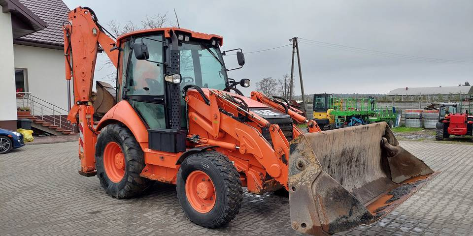 Koparko-ładowarka Caterpillar 432F - Kotrórakodó: 5 kép. Koparko-ładowarka Caterpillar 432F - Kotrórakodó: 5 kép.