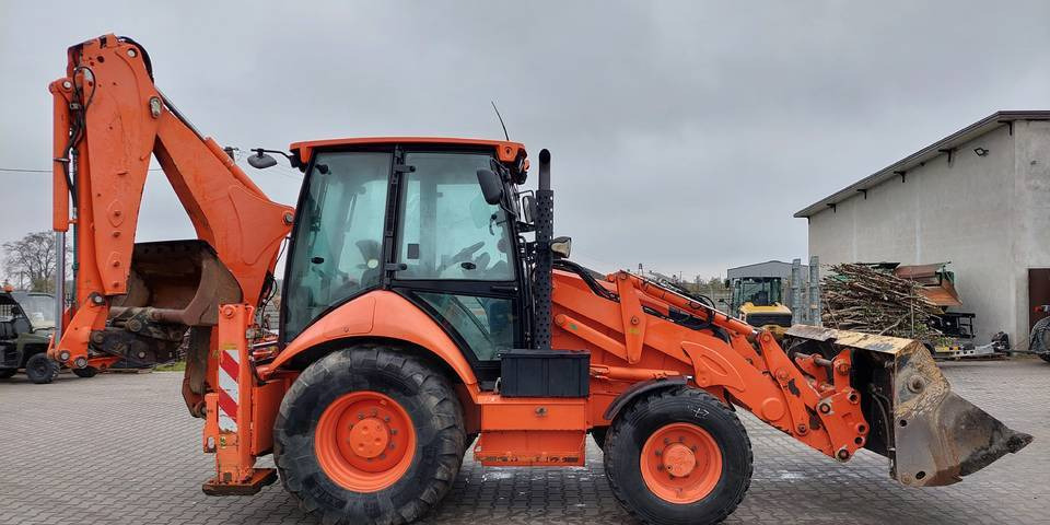 Koparko-ładowarka Caterpillar 432F - Kotrórakodó: 4 kép. Koparko-ładowarka Caterpillar 432F - Kotrórakodó: 4 kép.