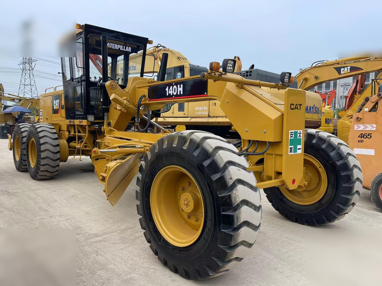 CATERPILLAR 140H - Gréder: 2 kép. CATERPILLAR 140H - Gréder: 2 kép.
