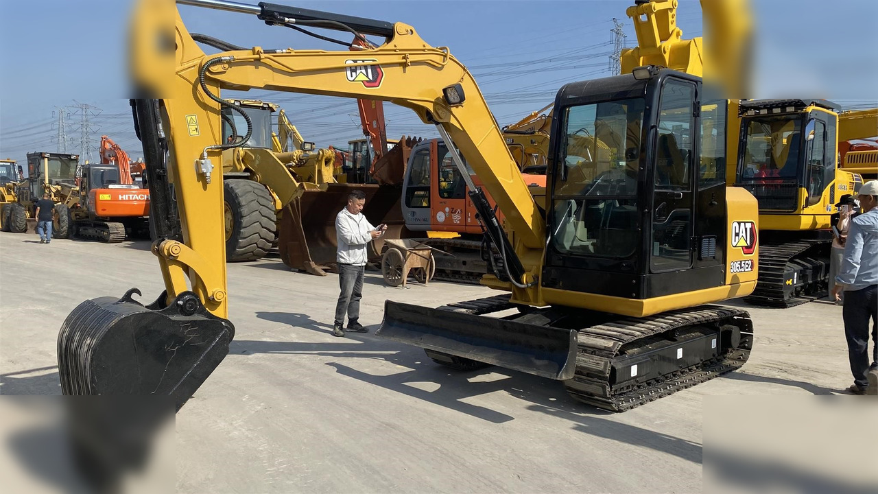CATERPILLAR 305.5E - Minikotró: 4 kép. CATERPILLAR 305.5E - Minikotró: 4 kép.