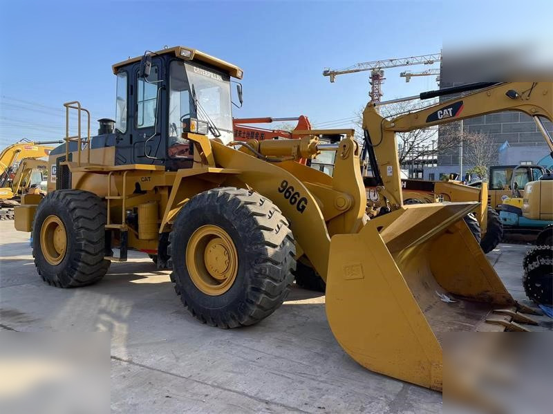 CATERPILLAR 966G - Gumikerekes homlokrakodó: 1 kép. CATERPILLAR 966G - Gumikerekes homlokrakodó: 1 kép.