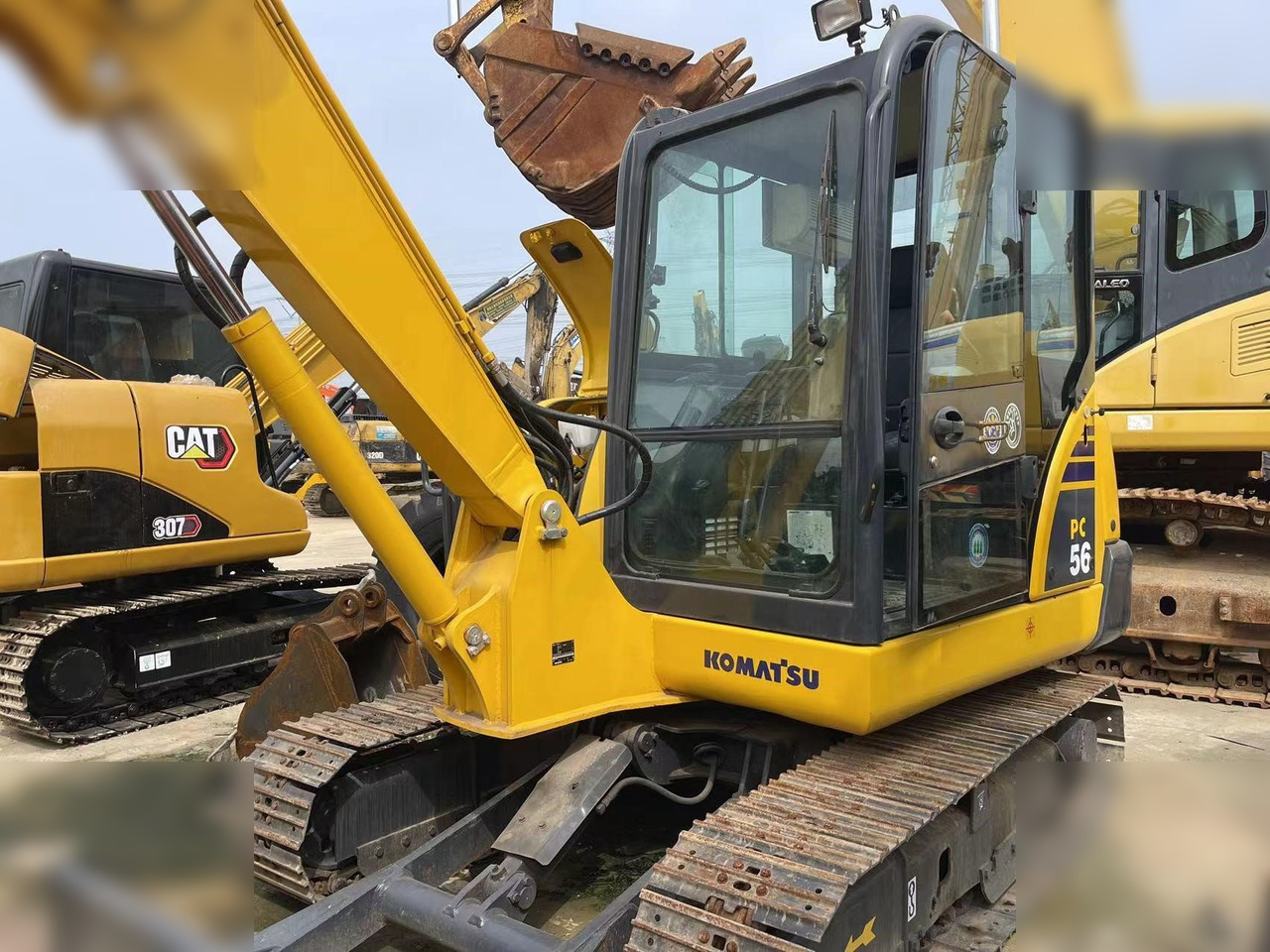 KOMATSU PC56-7 - Minikotró: 4 kép. KOMATSU PC56-7 - Minikotró: 4 kép.