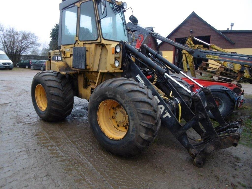 CAT IT12 Viking med cummins motor - Gumikerekes homlokrakodó: 1 kép. CAT IT12 Viking med cummins motor - Gumikerekes homlokrakodó: 1 kép.