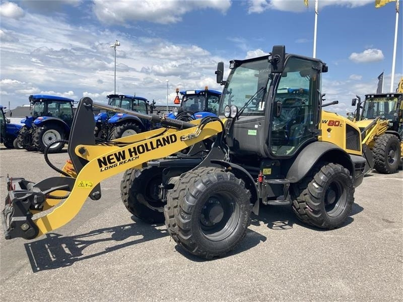 New Holland W80C ZR-HS Long Reach - High Speed - Gumikerekes homlokrakodó: 1 kép. New Holland W80C ZR-HS Long Reach - High Speed - Gumikerekes homlokrakodó: 1 kép.