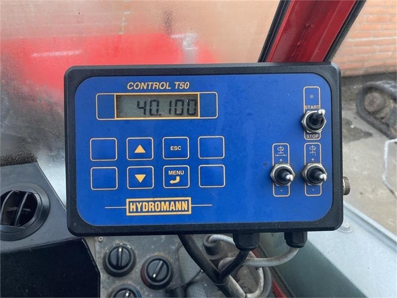 Kommunális traktor Timan Tool-Trac 245: 11 kép.