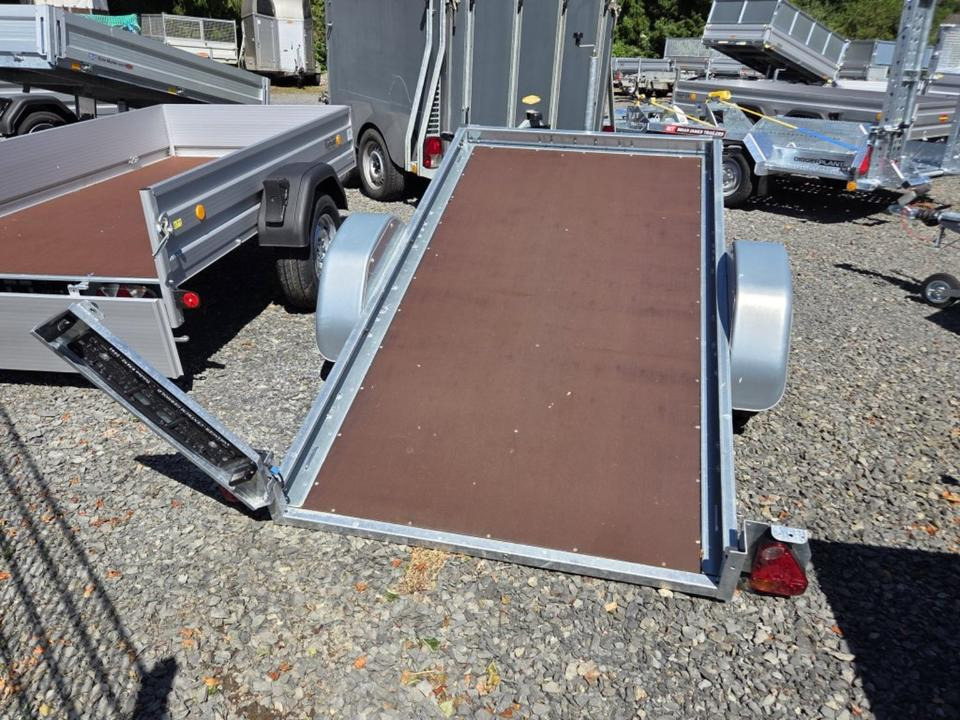 PKW-Anhänger 13 Stützrad Kippbar Motorrad Rasenmäher Quad 100km/h - Motorszállító utánfutó: 4 kép. PKW-Anhänger 13 Stützrad Kippbar Motorrad Rasenmäher Quad 100km/h - Motorszállító utánfutó: 4 kép.