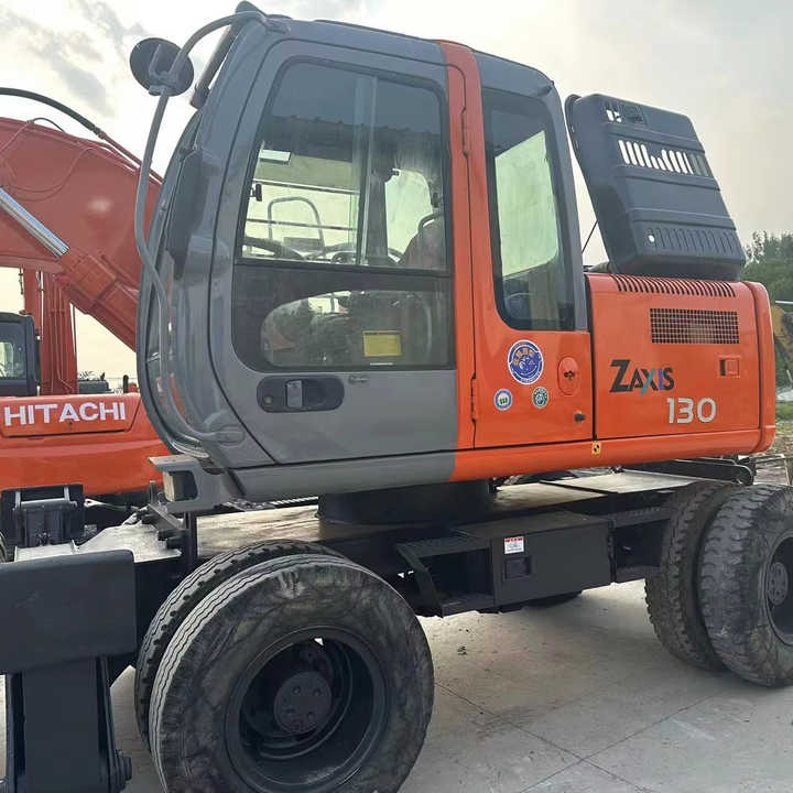 Hot Sale! Used Hitachi ZX130 Wheel Excavator |Excellent Condition| Best Price | Perfect for Construction & Road Projects - Gumikerekes kotró: 1 kép. Hot Sale! Used Hitachi ZX130 Wheel Excavator |Excellent Condition| Best Price | Perfect for Construction & Road Projects - Gumikerekes kotró: 1 kép.