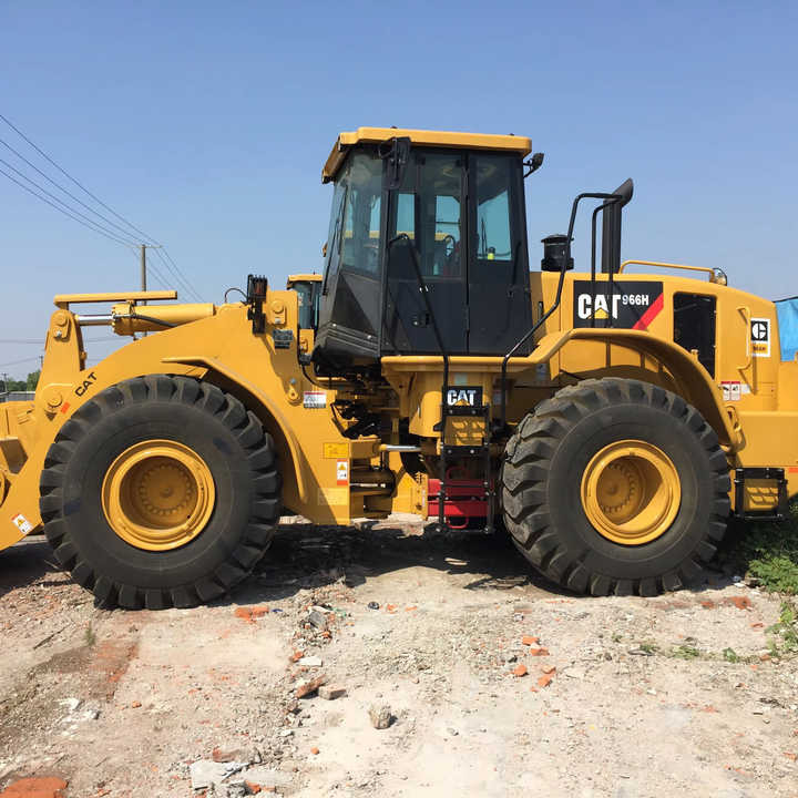 New Arrival USA Cat Machinery 966H Wheel Loader CAT 950 966 980 Wheel Loader Caterpillar Machine CAT 966H Used Wheel Loader - Gumikerekes homlokrakodó: 1 kép. New Arrival USA Cat Machinery 966H Wheel Loader CAT 950 966 980 Wheel Loader Caterpillar Machine CAT 966H Used Wheel Loader - Gumikerekes homlokrakodó: 1 kép.