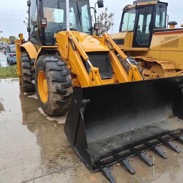 Used Backhoe Loader JCB 4x4 Wheel 20 Ton Backhoe Loader JCB 3CX 4CX Backhoe Excavator Loader Fpr Sale - Kotrórakodó: 5 kép. Used Backhoe Loader JCB 4x4 Wheel 20 Ton Backhoe Loader JCB 3CX 4CX Backhoe Excavator Loader Fpr Sale - Kotrórakodó: 5 kép.