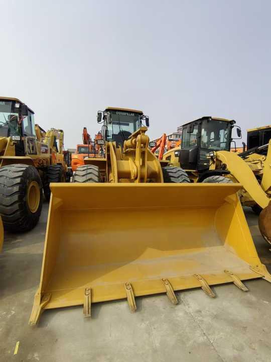 Used CAT 966h Wheel Loader Original Cheap Used Wheel Loader CAT 950 966 Wheel Loaders for Sale - Gumikerekes homlokrakodó: 3 kép. Used CAT 966h Wheel Loader Original Cheap Used Wheel Loader CAT 950 966 Wheel Loaders for Sale - Gumikerekes homlokrakodó: 3 kép.