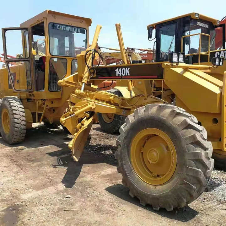 Used Cat 140K New Model Grader Popular Brand Japan Cat Hydraulic Machinery Construction Equipment - Gréder: 1 kép. Used Cat 140K New Model Grader Popular Brand Japan Cat Hydraulic Machinery Construction Equipment - Gréder: 1 kép.