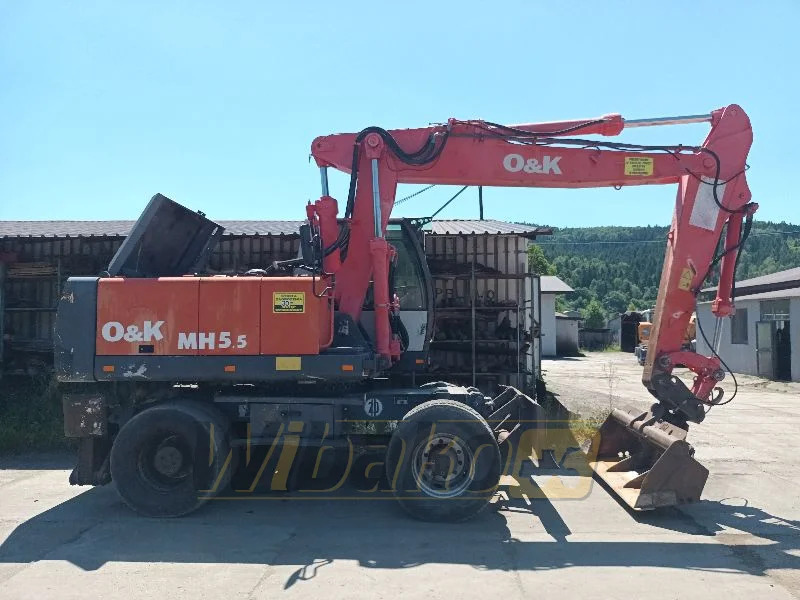 O&K MH5.5 - Gumikerekes kotró: 2 kép. O&K MH5.5 - Gumikerekes kotró: 2 kép.