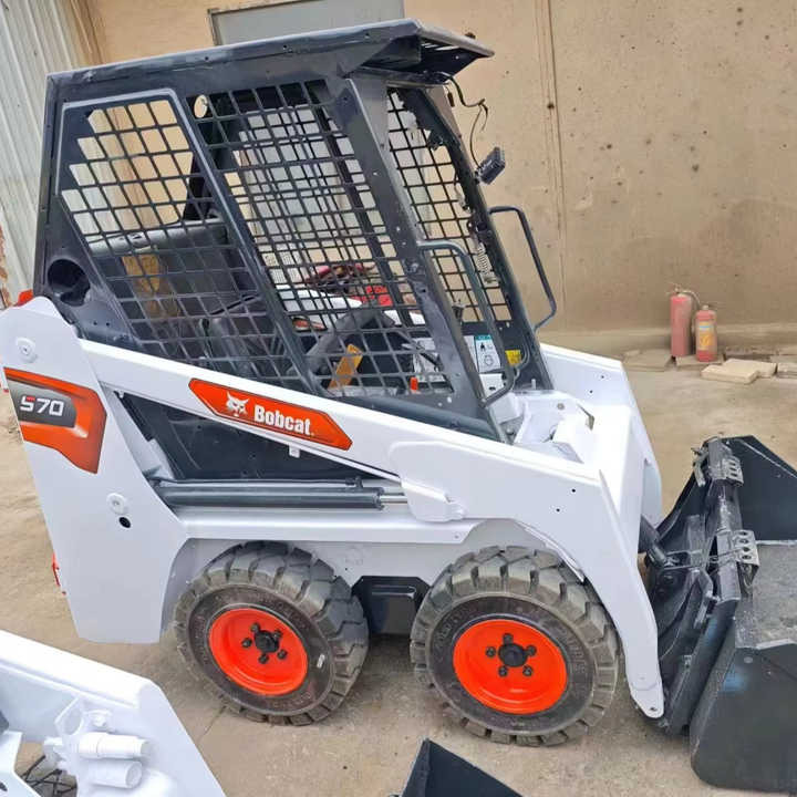 Second Hand Bobcat S70 Skid Steer Loader on Stock Excellent Performance Bobcat S70 S160 S300 330 Skid Steer for Sale - Mini homlokrakodó: 1 kép. Second Hand Bobcat S70 Skid Steer Loader on Stock Excellent Performance Bobcat S70 S160 S300 330 Skid Steer for Sale - Mini homlokrakodó: 1 kép.