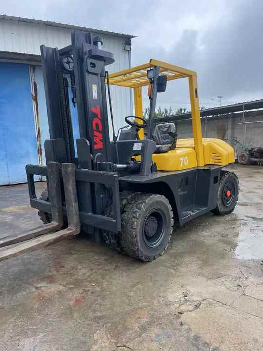 Seconh Hand Original tcm 7tons Forklift in High Quality on Hot Sale Used Building Construction Equipment for Sale - Villás targonca: 2 kép. Seconh Hand Original tcm 7tons Forklift in High Quality on Hot Sale Used Building Construction Equipment for Sale - Villás targonca: 2 kép.