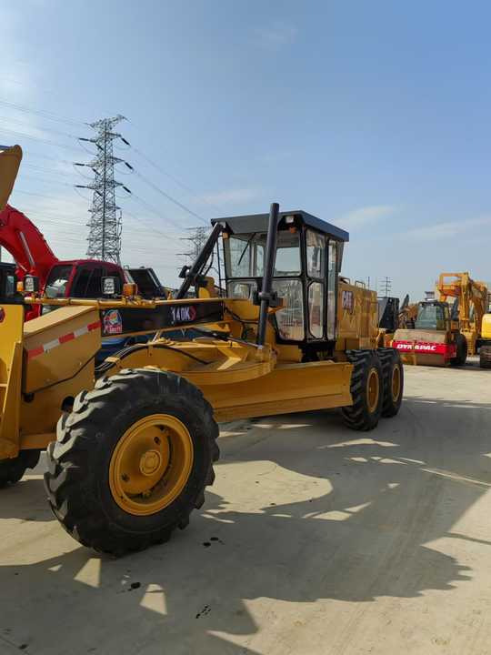 Used CAT 140k Model Grader Second Hand Machine Popular Brand JAPAN CAT Hydraulic Machinery - Gréder: 3 kép. Used CAT 140k Model Grader Second Hand Machine Popular Brand JAPAN CAT Hydraulic Machinery - Gréder: 3 kép.