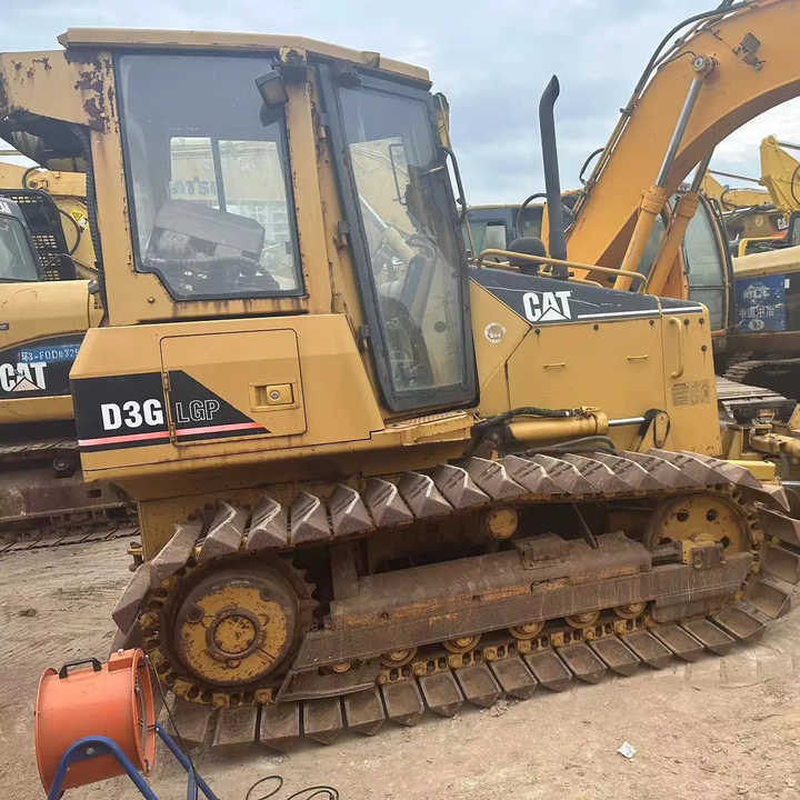 Used Caterpillar CAT D3G Land Road Motor Bulldozer CAT Used Grader Cheap Price for Sale - Buldózer: 1 kép. Used Caterpillar CAT D3G Land Road Motor Bulldozer CAT Used Grader Cheap Price for Sale - Buldózer: 1 kép.