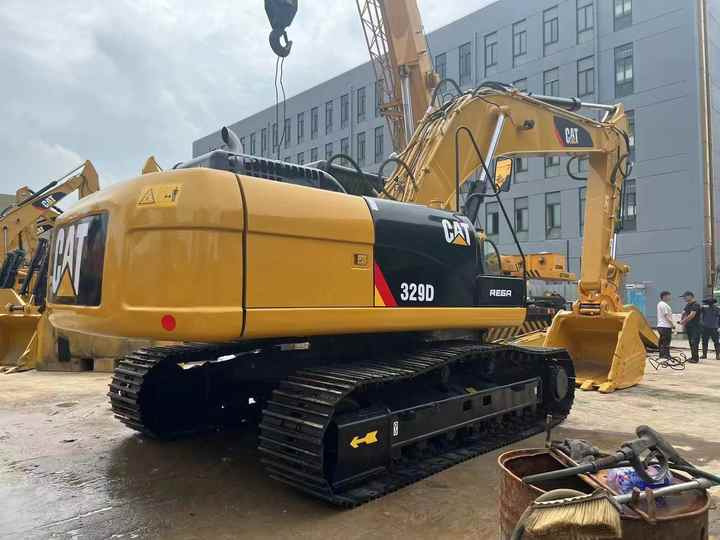Used Digger CAT 329D Construction Machinery Construction Digger Used CAT 329D Cheap Excavator - Lánctalpas kotró: 3 kép. Used Digger CAT 329D Construction Machinery Construction Digger Used CAT 329D Cheap Excavator - Lánctalpas kotró: 3 kép.