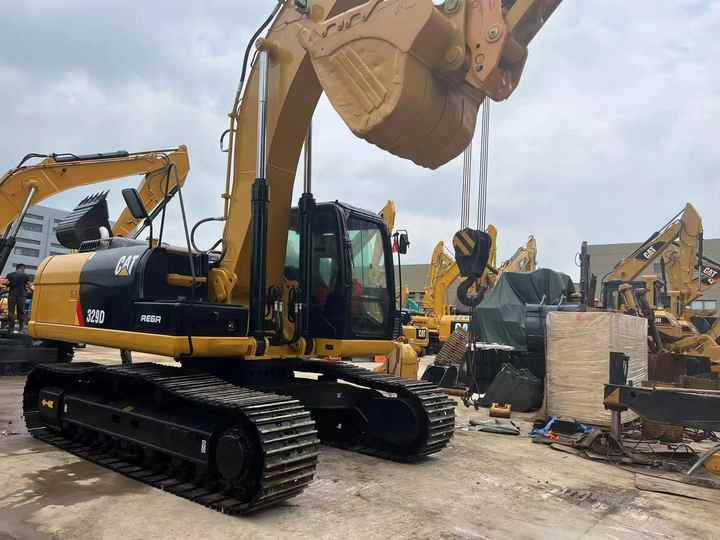 Used Digger CAT 329D Construction Machinery Construction Digger Used CAT 329D Cheap Excavator - Lánctalpas kotró: 2 kép. Used Digger CAT 329D Construction Machinery Construction Digger Used CAT 329D Cheap Excavator - Lánctalpas kotró: 2 kép.
