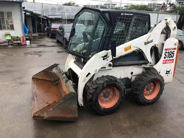 Used Heavy Construction Equipment bobcat S185 Second Hand Skid Steers Used Machine Hot Sale - Mini homlokrakodó: 3 kép. Used Heavy Construction Equipment bobcat S185 Second Hand Skid Steers Used Machine Hot Sale - Mini homlokrakodó: 3 kép.