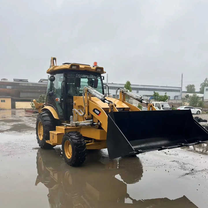 Used Wheel Loader CAT420F Caterpillar 420F Construction Machinery Mini Wheel Skid Steer Loader in Stock - Kotrórakodó: 4 kép. Used Wheel Loader CAT420F Caterpillar 420F Construction Machinery Mini Wheel Skid Steer Loader in Stock - Kotrórakodó: 4 kép.